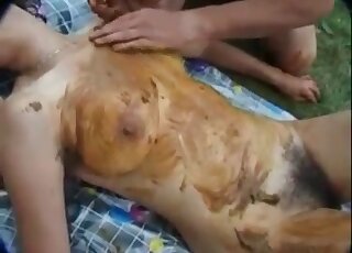 Shitting on the nice tis and body of a woman