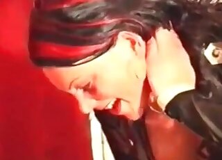 Low quality video of a submissive man and a dominatrix