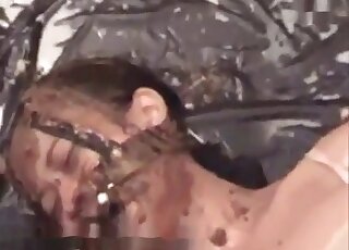 Submissive women on the floor playing with the scat kink