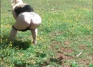 Dogs arriving outdoors to watch her public poop