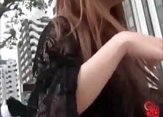 Hoping that no one will see her as she shits